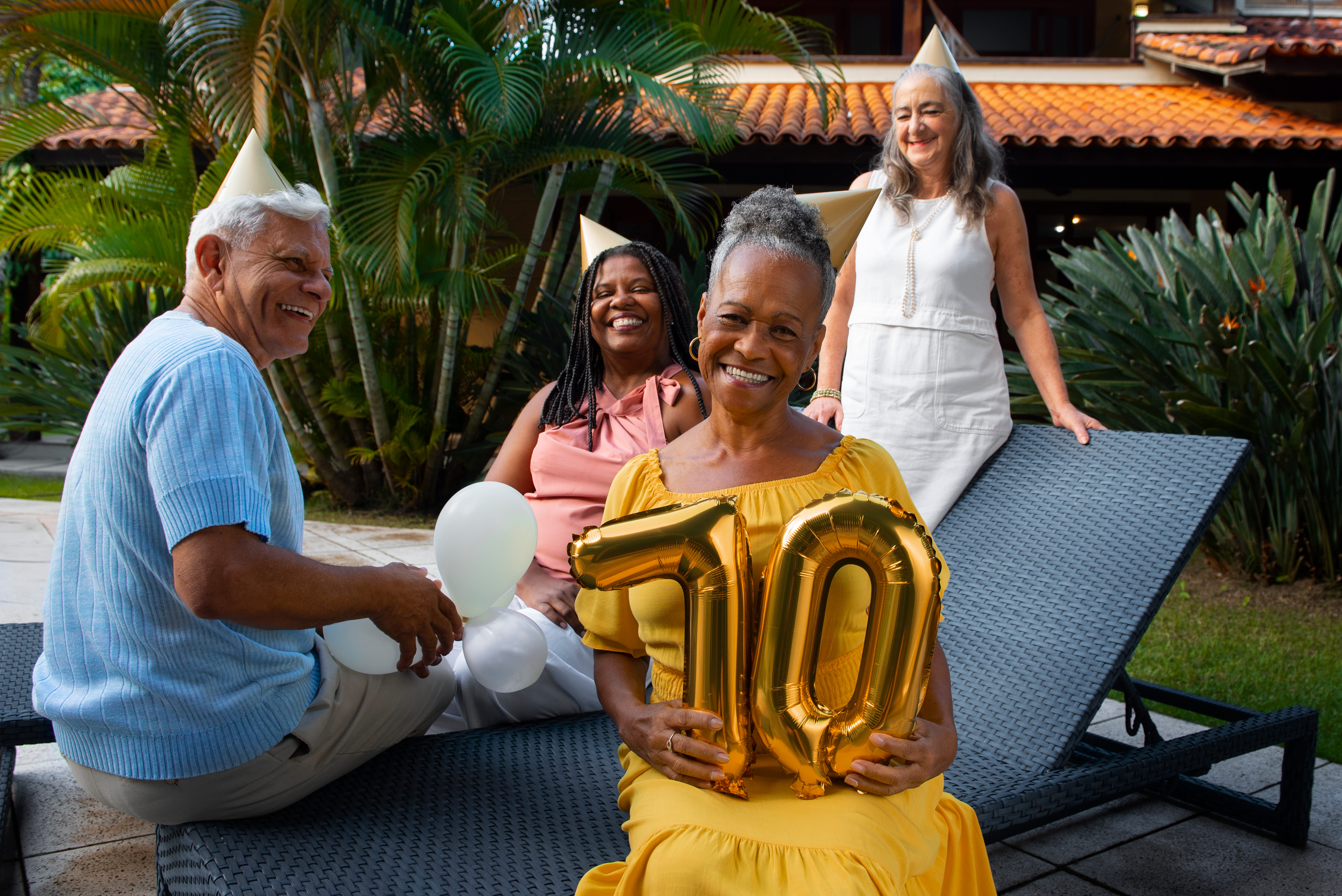 Family and caregiver celebrating together