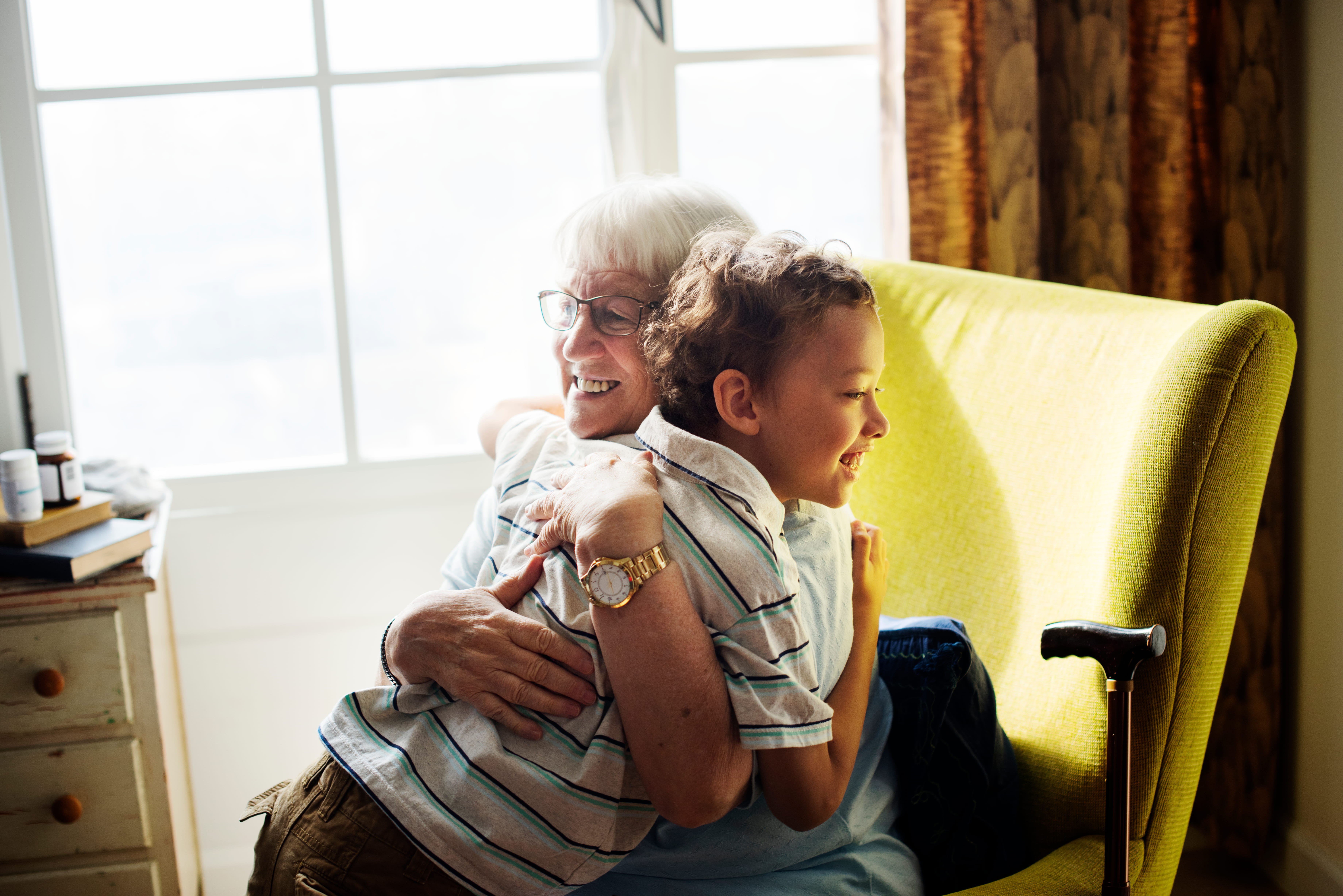 Family member hugging an older adult